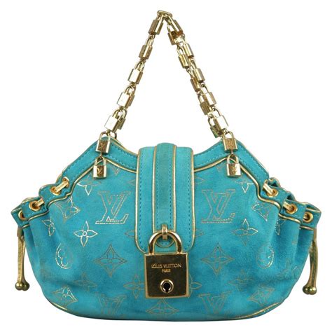 blue louis vuitton bag gold lock